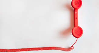 Immagine di a red desktop phone handle